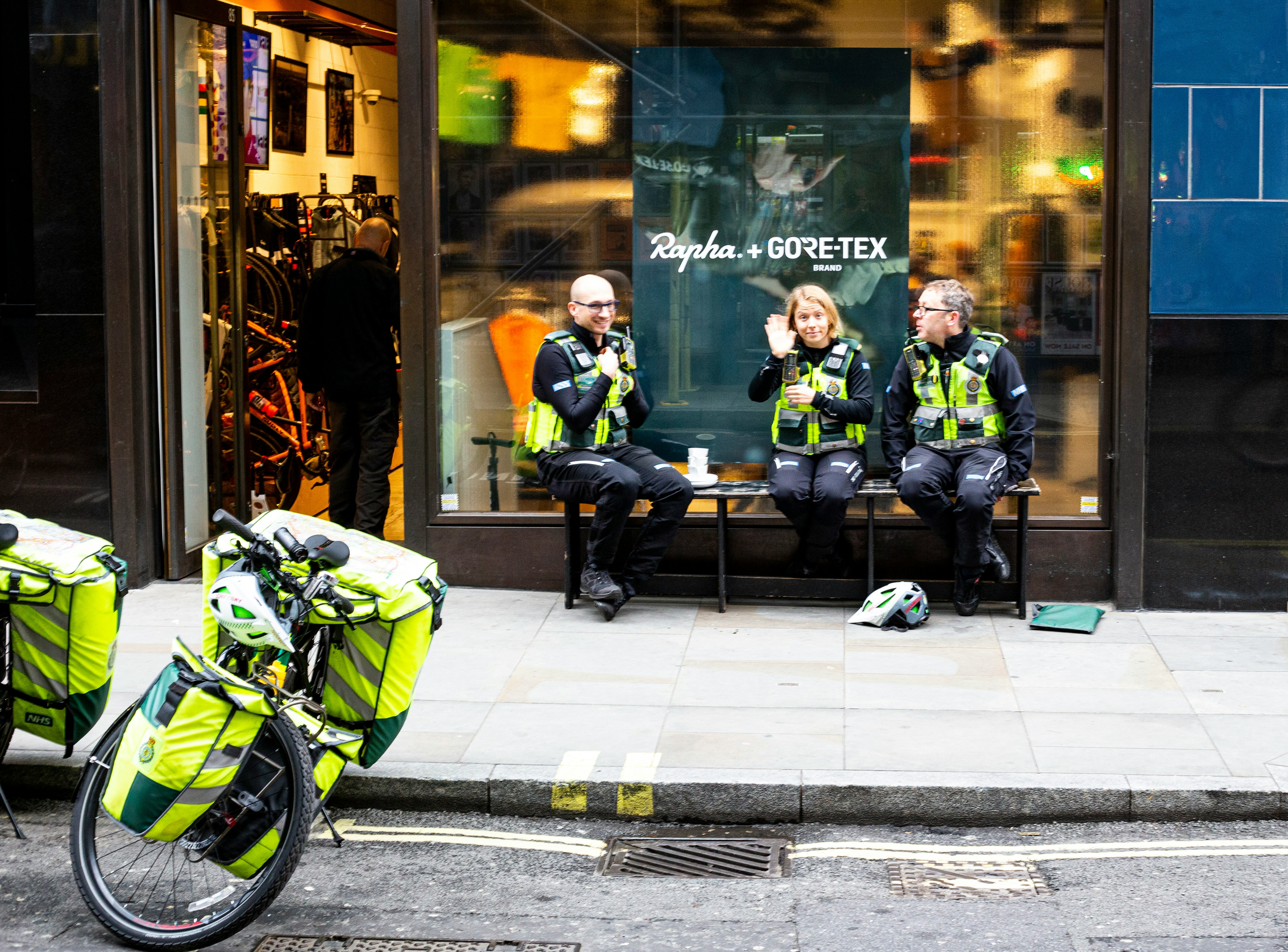 cafe with police sitting outside front